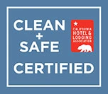 The image shows a "Clean + Safe Certified" logo from the California Hotel & Lodging Association, indicating adherence to hygiene standards. logo on footer section.